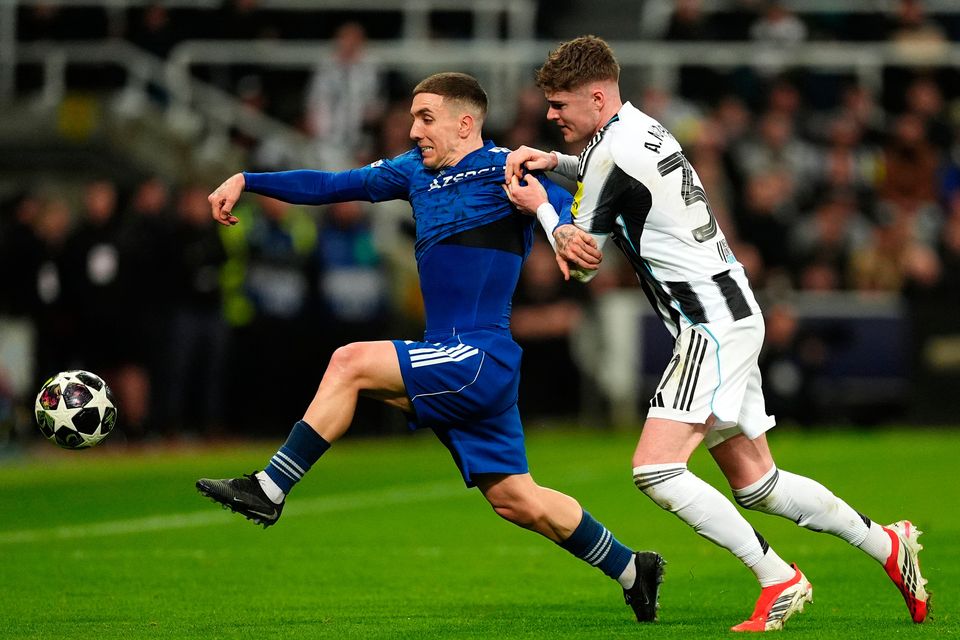 Qarabag's Joni Montiel (left) and Newcastle United's Alex Murphy
